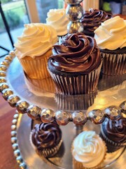 Elegant Cupcakes on Metallic Stand, Eye-Level Perspective