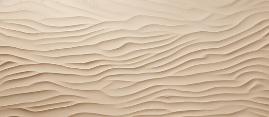 The sand beige textured background features an abstract patterned wall providing ample copy space for creative use