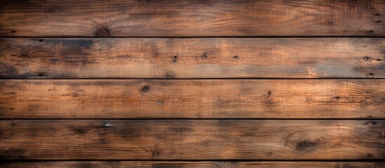 Fototapeta premium An image featuring a rustic background created from aged wooden planks providing an empty space for including texts or slogans. Copyspace image