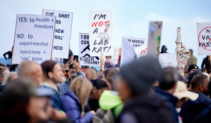 Crowd, people and protest with sign for vaccine corruption, solidarity and human rights in medical...