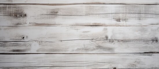 Naklejka premium The weathered white wooden planks serve as a background with a worn surface texture making it an ideal graphic design element with available copy space image