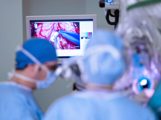 in neurosurgery surgery, neurosurgeons operate with microscopes with high imaging technology, O-arm...