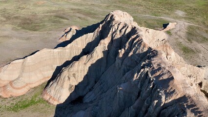 Looking down on Badlands South Dakota eroding rock formations and sedimentation soil layers with prehistoric fossilized remains in Butte where inland sea was 75 million years ago