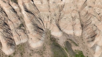 Looking down on Badlands South Dakota eroding rock formations and sedimentation soil layers with prehistoric fossilized remains in Butte where inland sea was 75 million years ago