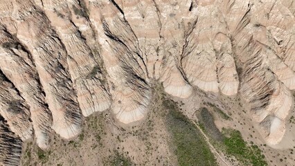 Looking down on Badlands South Dakota eroding rock formations and sedimentation soil layers with prehistoric fossilized remains in Butte where inland sea was 75 million years ago