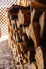 view of a neatly stacked woodpile far focus