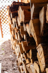 view of a neatly stacked woodpile close focus