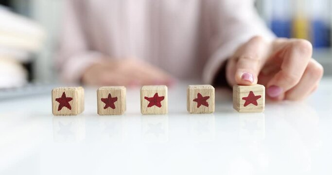 Adding a fifth star in customer review of services. Feedback and recommendation concept