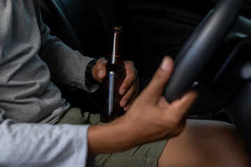 That's a dangerous thing to do. Drinking beer while driving is both illegal and unsafe.