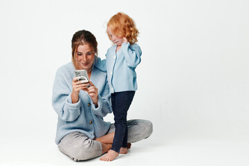 Mother and daughter bonding over technology sharing moments of connection and learning together