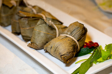 Meat bags, rice dumplings, rice dumplings, tables, disks, hot,