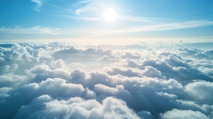Aerial view White clouds in blue sky, high above the Earth's surface, creating a picturesque scene