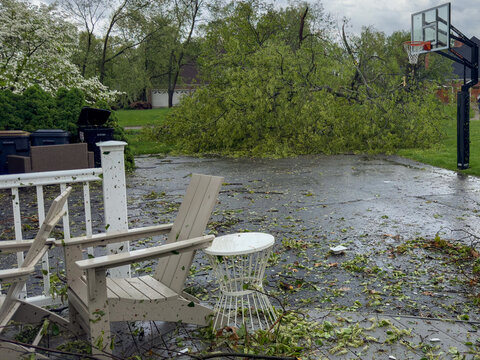 Tornado Damage and Fallen Trees on Home in Michigan
