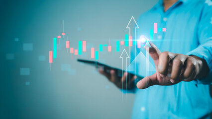 Businessman or trader is showing a growing virtual hologram stock, Invest in trading, Stock market, Business growth, progress or success concept.