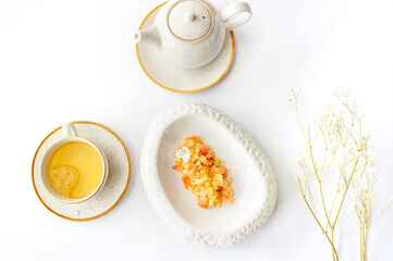 Light breakfast in a restaurant with green tea and dessert