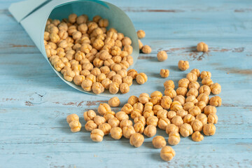 Crispy Roasted Chickpeas on blue wooden background.
