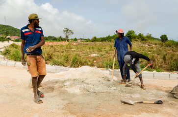 Men Working On Road Construction Site