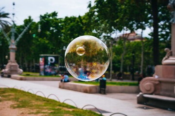 Soap bubble in the air