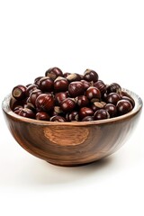 Obraz premium Horse chestnuts in bowl on white background