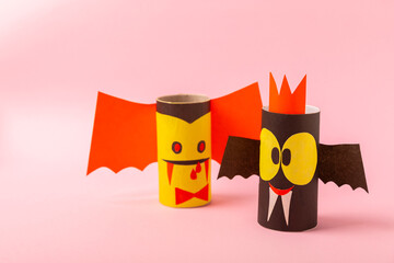 Toilet paper crafts on a colored background. Kids crafts made with toilet paper roll. DIY. Handmade. Paper toys. Origami animals. Concept of children's educational games. Place for text. Copy space.