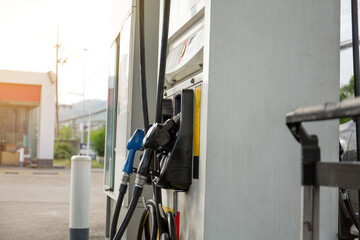 Gasoline station prepare for traveller fill to tank  near  shop and sun light.