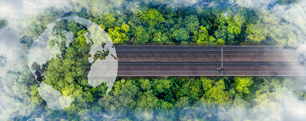 Forest road with Layout of earth planet  on through forest. Save Earth. Concept of the Environment World Earth Day. Car with nature
