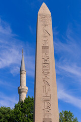 Architectural details, ancient Egyptian obelisk of the pharaoh on the square in the city of...