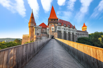 Amazing morning view of Hunyad Castle / Corvin's Castle with wooden bridge.