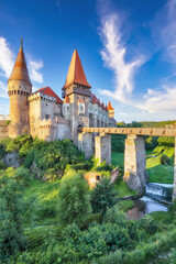 Amazing morning view of Hunyad Castle / Corvin's Castle with wooden bridge.