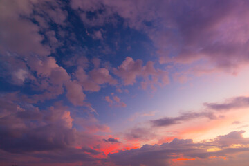 Clouds and orange sky,Real majestic sunrise sunset sky background with gentle colorful clouds...