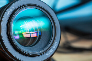 close-up camera lens,Photo Camera or Video lens close-up on black background, objective, concept of photographer camera man job, looking for a photographer,