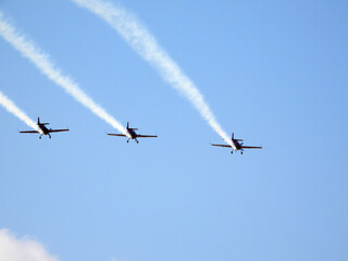 Three planes performing an airshow in the sky - Royal Air Force aircraft - jordanian army (Jordanian Independence Day) Amman - Jordan