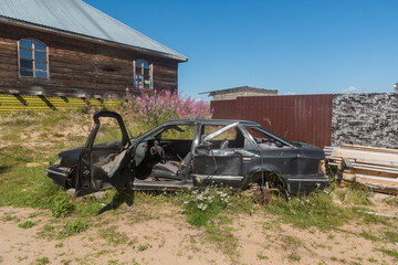 Abandoned old rusty body and car parts after an accident