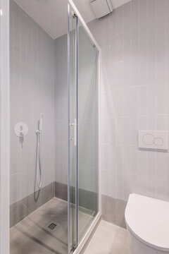 Modern and sober shower cabin in white tones