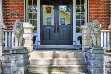 Elegant Suburban Home Entrance with Lion Statues, Fort Wayne