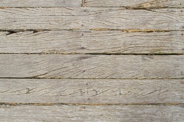 texture of old weathered wooden sea break