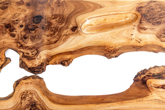 Live edge elm burl slab table top with central epoxy resin river on white background, combining natural wood with a synthetic material