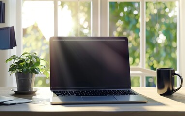 Laptop on desk with coffee mug and plant in sunny, minimalist office.