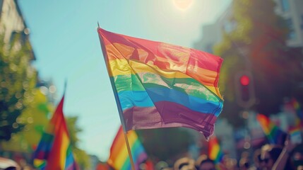 Fototapeta premium A festive parade of LGBTQ+ pride, with rainbow flags fluttering in the wind.