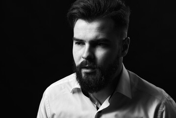 Portrait of a man on a black background. Grain effect used