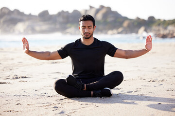 Yoga, meditation and spiritual man on beach with peace from mindfulness or self care for healthy...