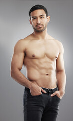 Asian man, muscle and portrait or fitness confidence with strong stomach in studio, grey background...