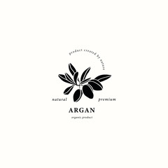 Flat vector argan nut with leaves logo