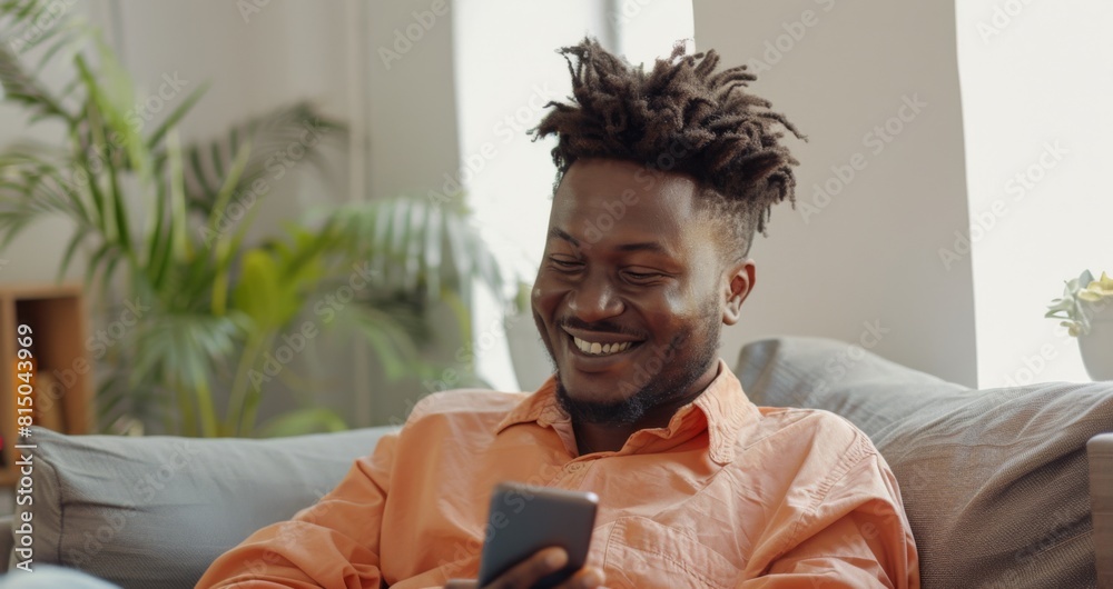 Wall mural Man Enjoying Time with Smartphone