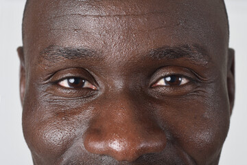 front view of a detail of a man's eyes looking into camera