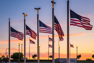 Twilight glow on American flags at Los Angeles National Cemetery during Memorial Day observance.