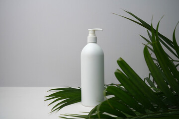 White plastic jar, container for liquid, sanitary supplement.
