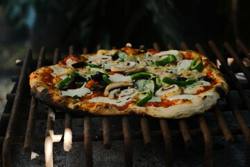 pizza on a grill