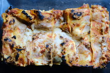 close-up of Lasagne with burned crost