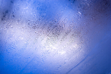 Condensation on the window. Raindrops on the glass. Abstract background.